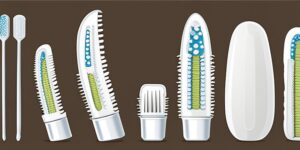 Cepillos de dientes usados como plantillas en un jardín